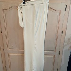 Beautiful for any occasion, especially the upcoming season. Size 8 slacks.